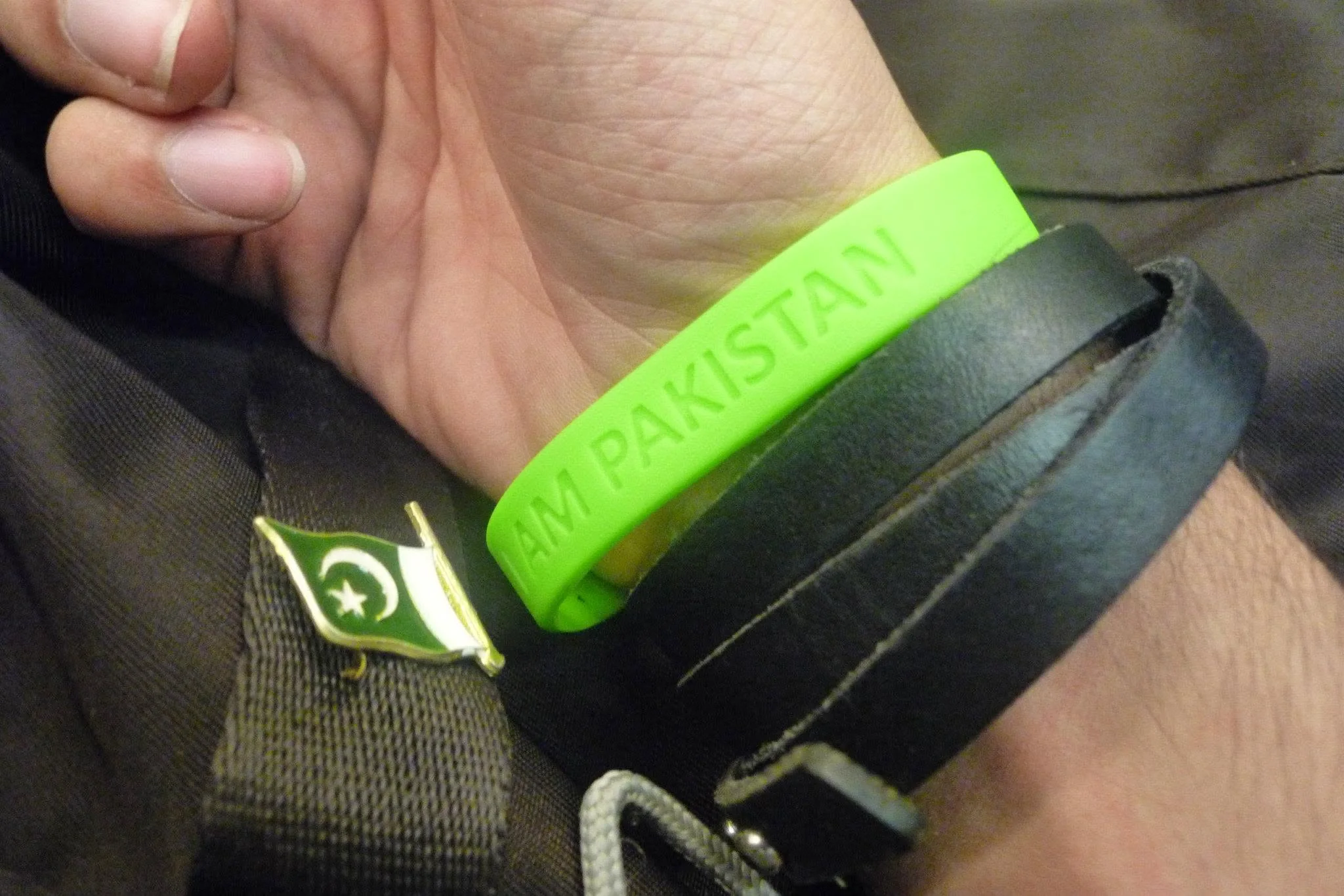 Green I Am Pakistan volunteer wristbands